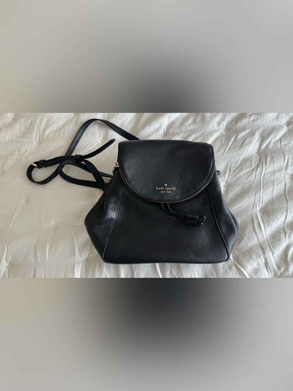 kate spade Black Pebbled Leather Backpack with Gold Logo